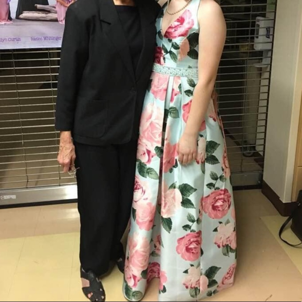 Floral halter dress. Macy’s size 5/6. Light blue, pink flowers and green leaves.